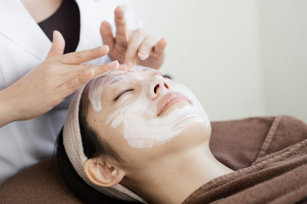 Japanese women receiving facial care